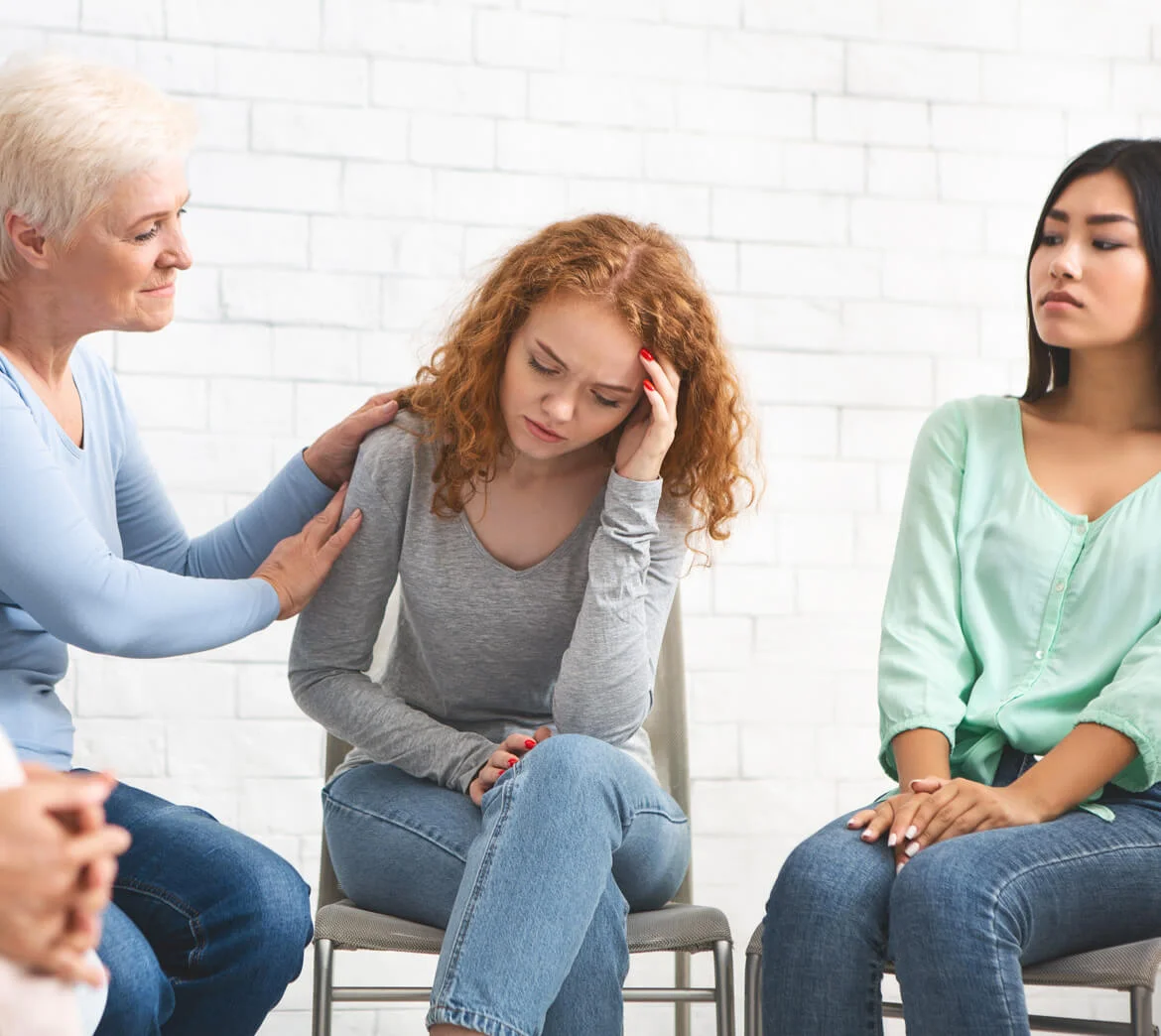 Therapist comforting client